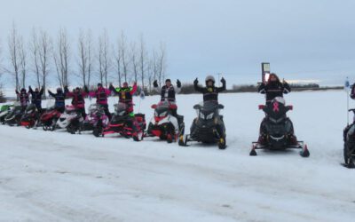 Prairie Women on Snowmobiles
